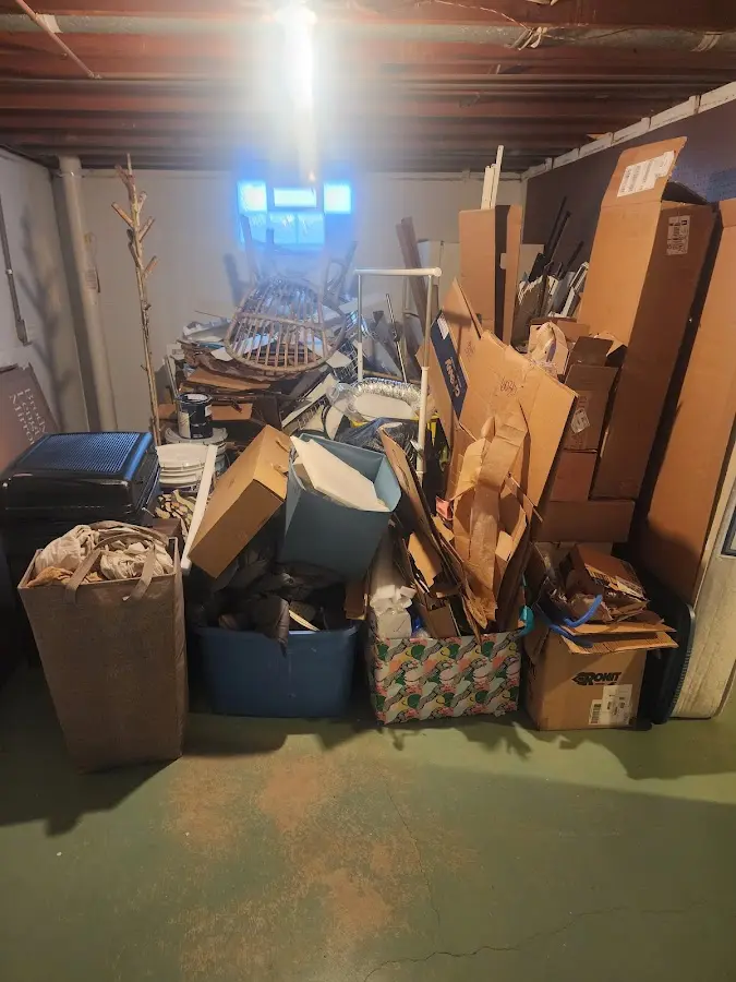 Roll-off dumpster container at job site for 20 Yard Dumpster Rental in Northville